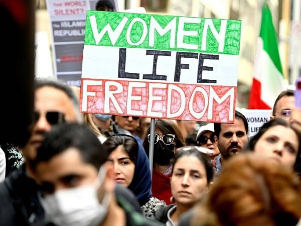 Women Life Free Poster A activist holding in The Mahsa Amini Protest